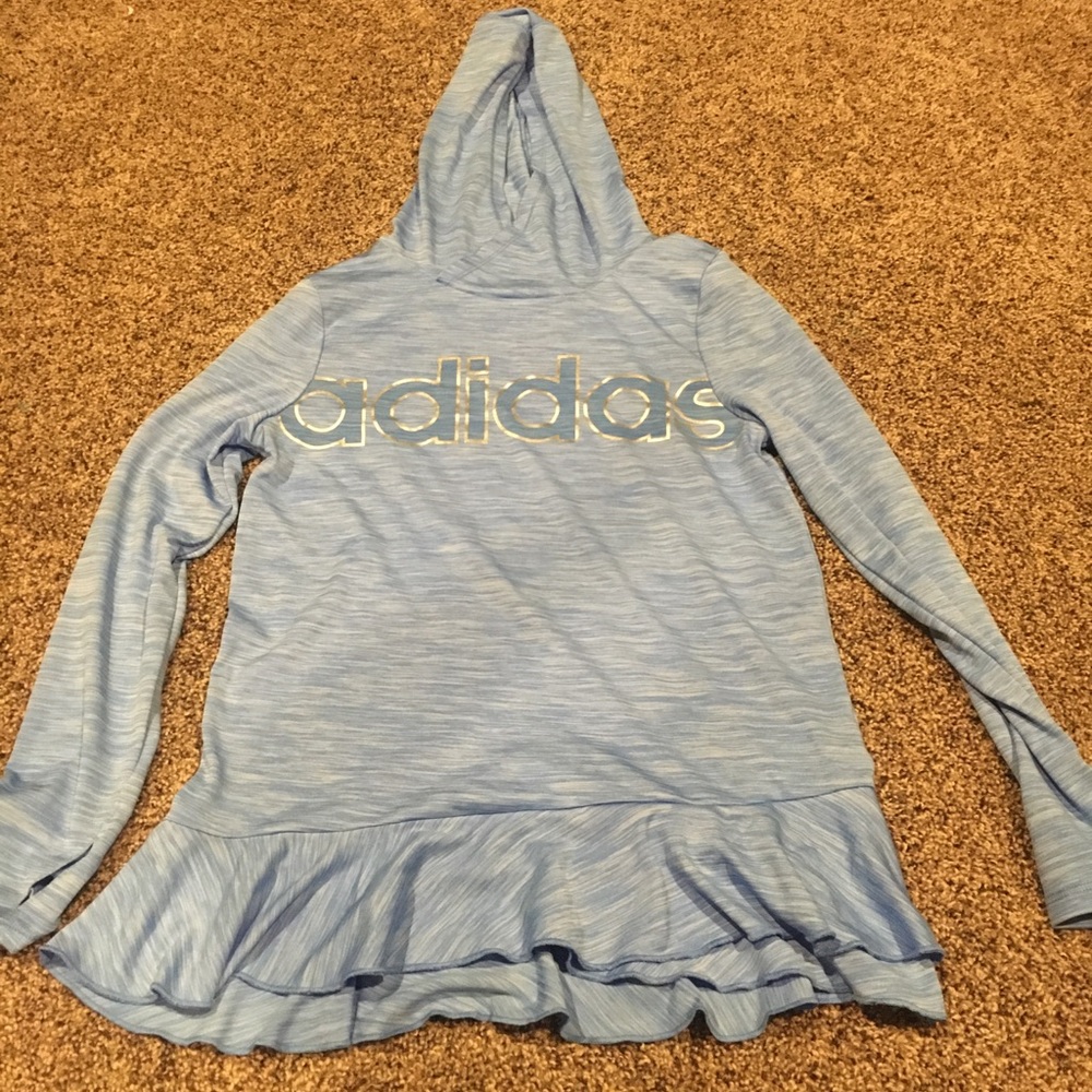 This is a cute sweatshirt like top
